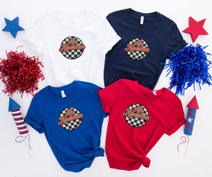 Four t-shirts, each with "All American" text on a checkered circle.