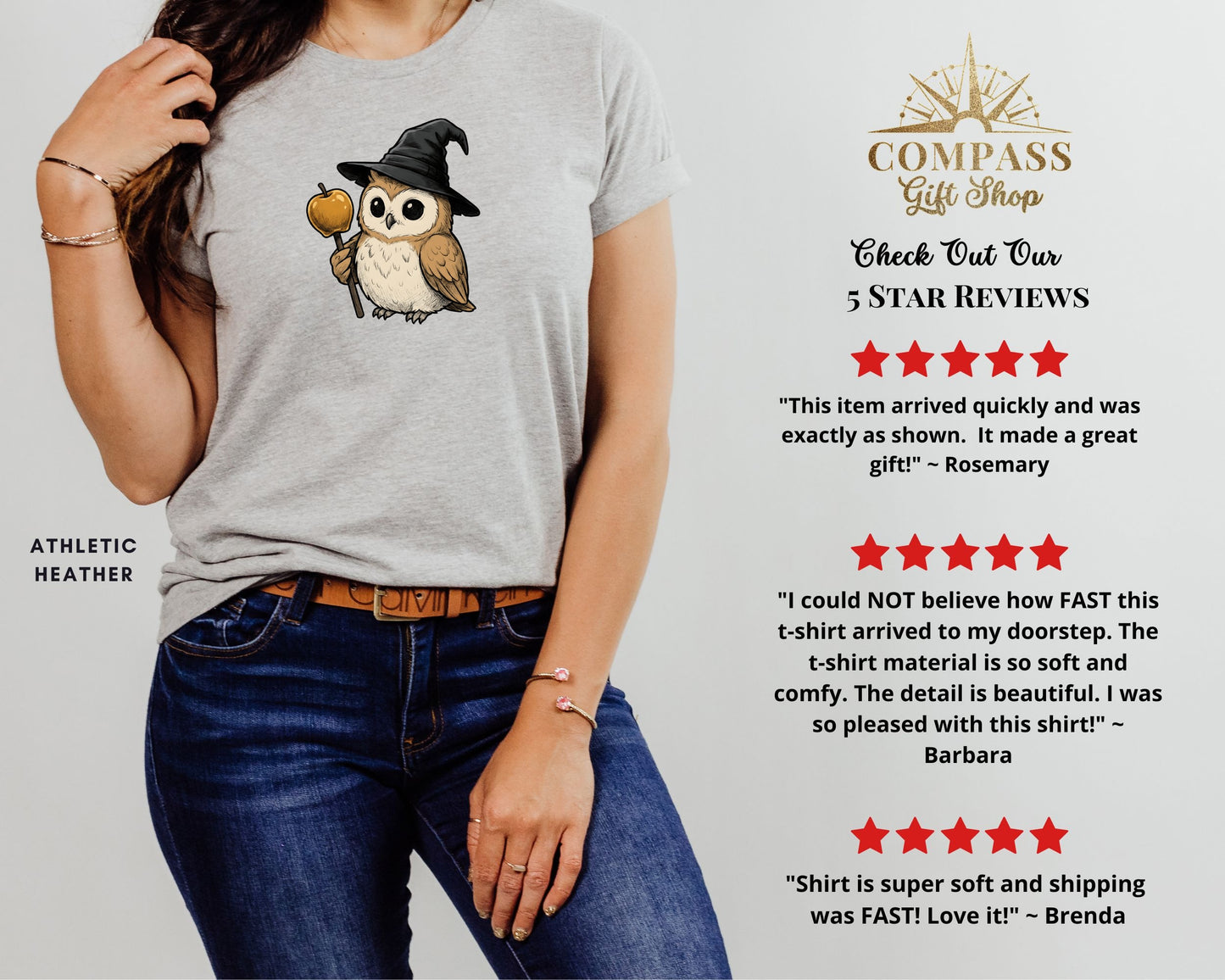 Grey t-shirt with an owl graphic wearing a witch hat and holding an apple.