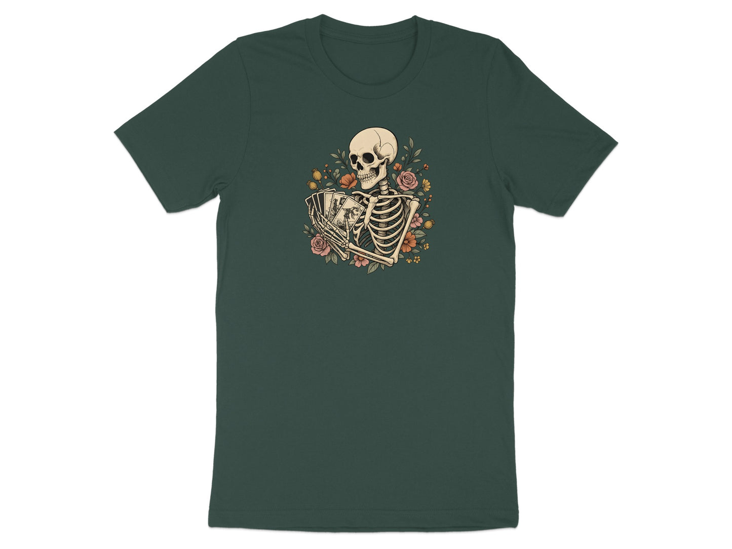 Skeleton with flowers holding playing cards on a dark green t-shirt.