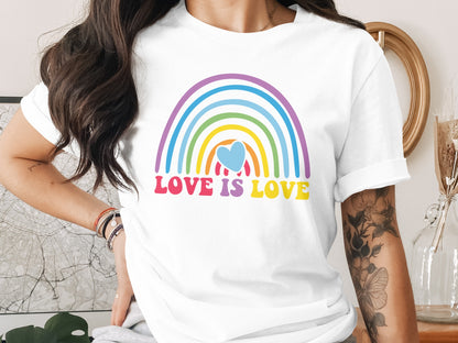 White t-shirt with rainbow and "LOVE IS LOVE" text.