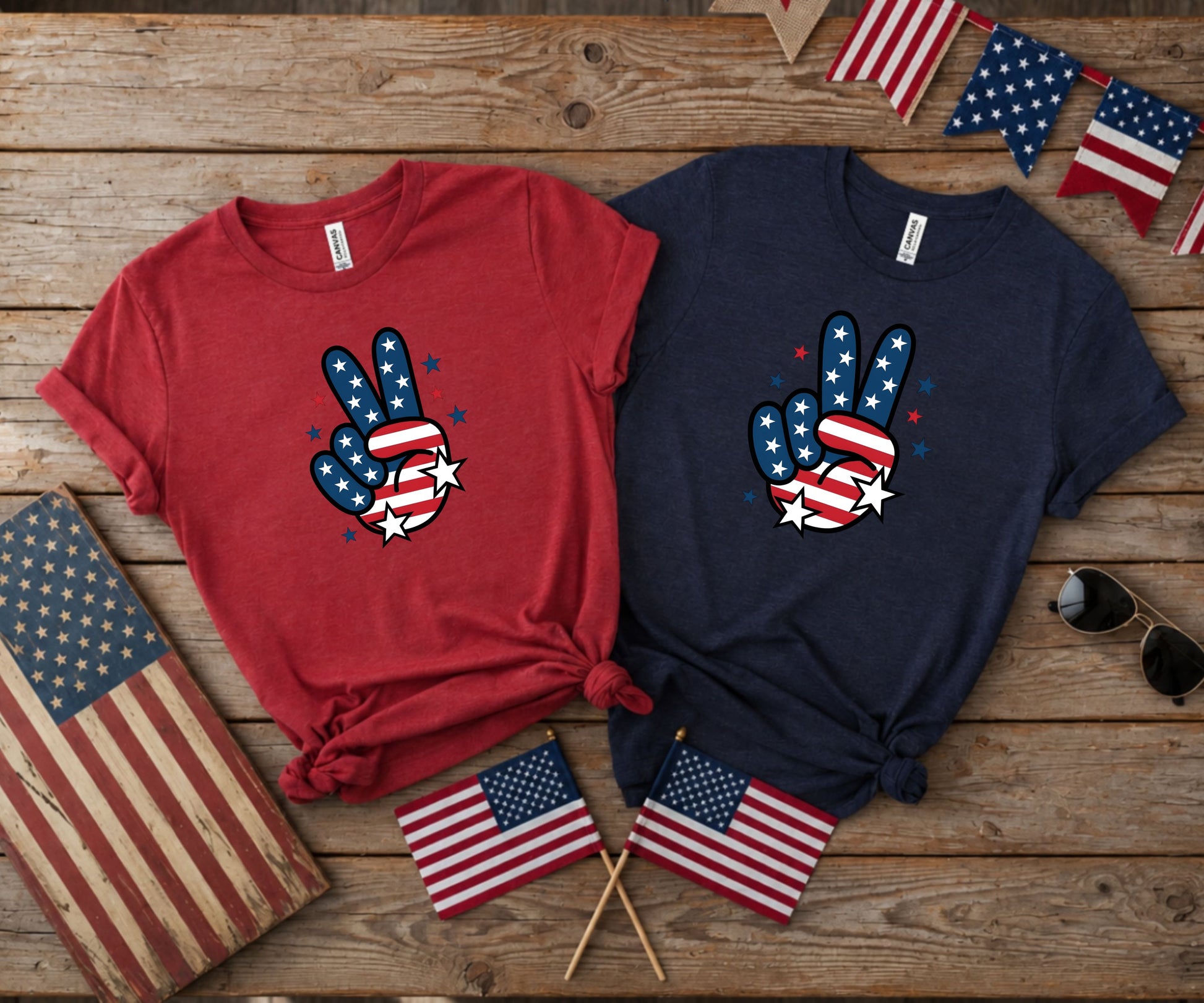 Two t-shirts with patriotic peace signs, USA flags and sunglasses.