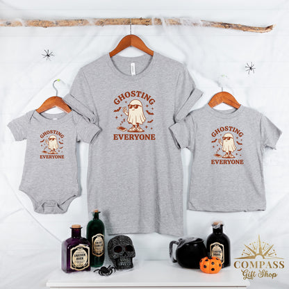Grey t-shirts and onesie with "Ghosting Everyone" text and a ghost graphic.