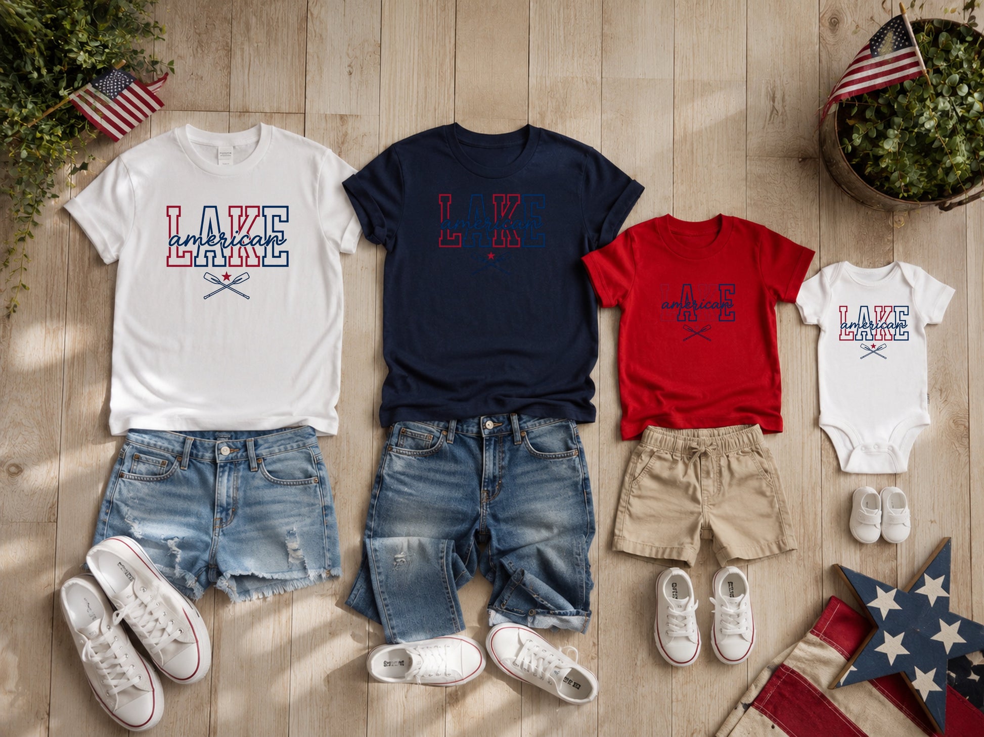Matching American flag themed t-shirts and onesie with denim shorts.