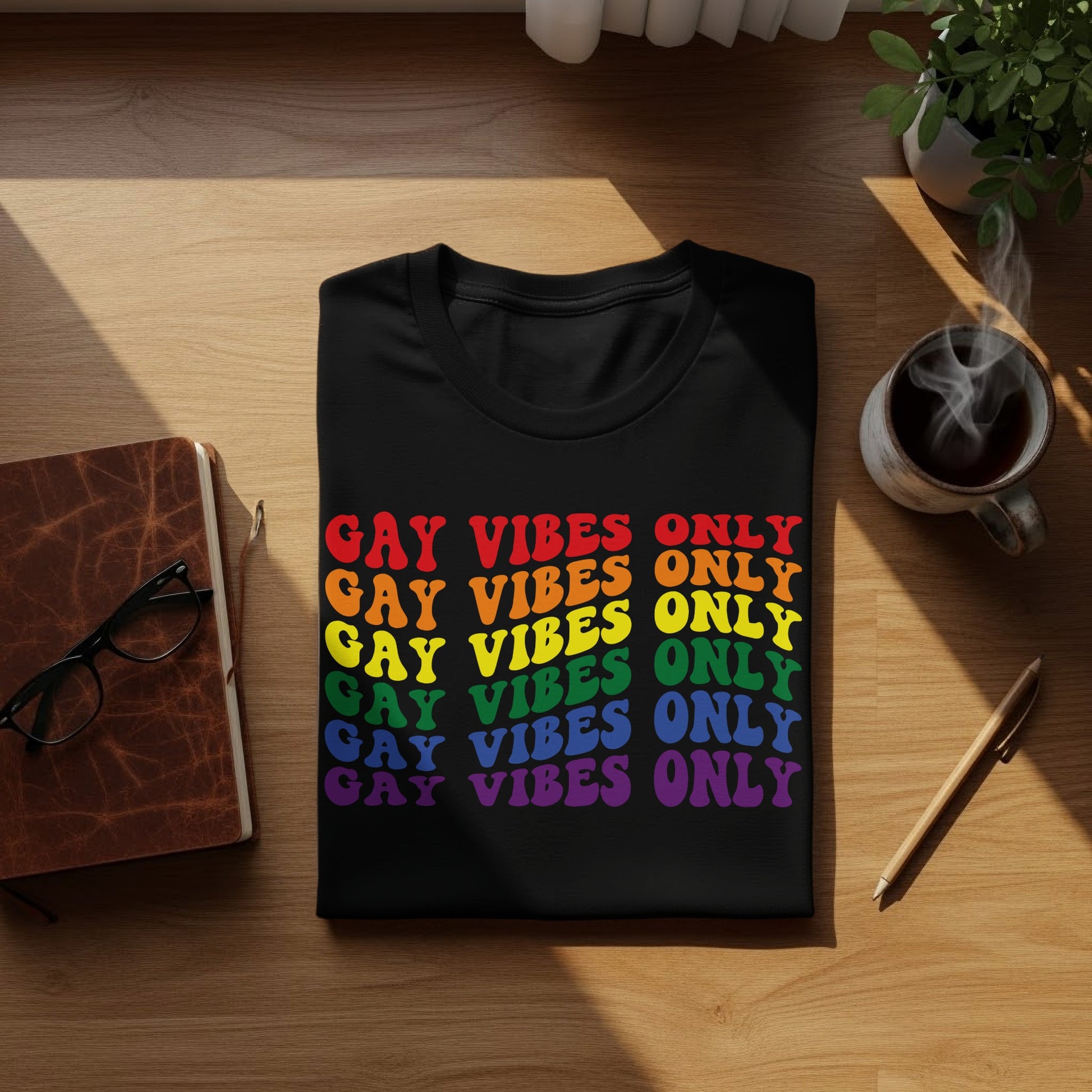 Black t-shirt with "GAY VIBES ONLY" in rainbow text.