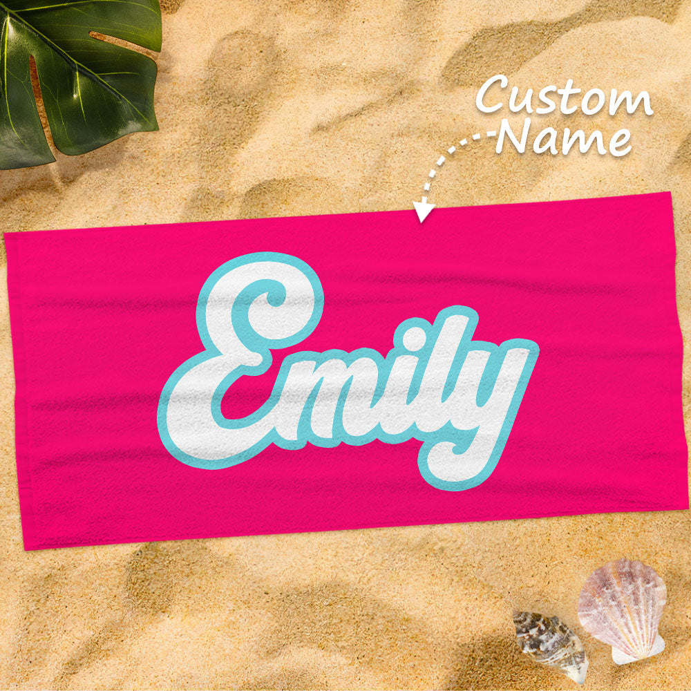 Bright_Beach_Towel_with_Personalized_Name_in_Hot_Pink on beach
