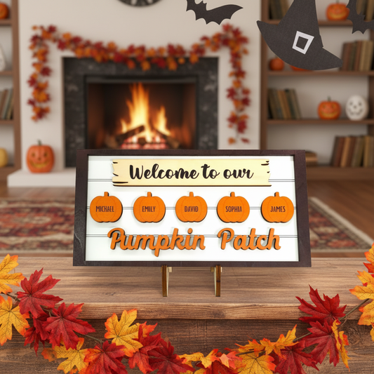 A personalized wooden sign reading 'Welcome to our Pumpkin Patch' with five pumpkin-shaped name cutouts, displayed on a stand in a cozy fall-themed room with a fireplace, autumn leaves, and witch hats.