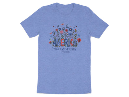 Blue t-shirt with "AMERICA" in floral lettering and "250th ANNIVERSARY 1776-2026" below.