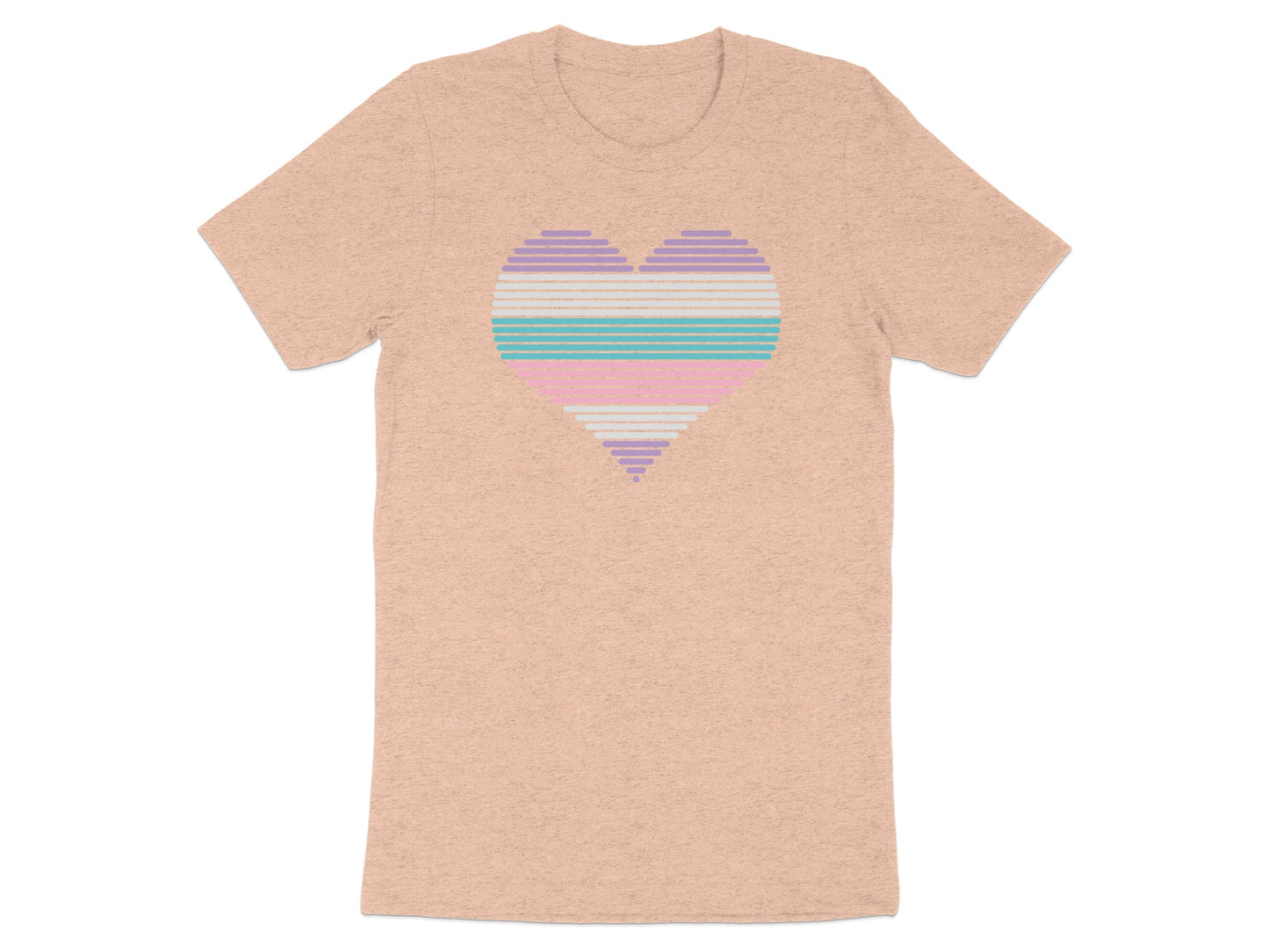 Peach t-shirt with a striped heart in pastel rainbow colors.