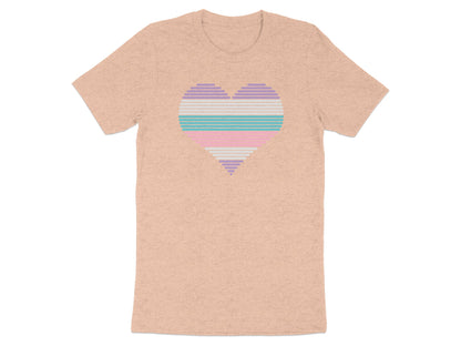 Peach t-shirt with a striped heart in pastel rainbow colors.