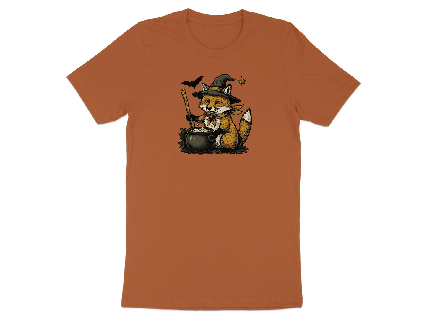 Fox in witch hat stirring cauldron with broom and bats on brown t-shirt.
