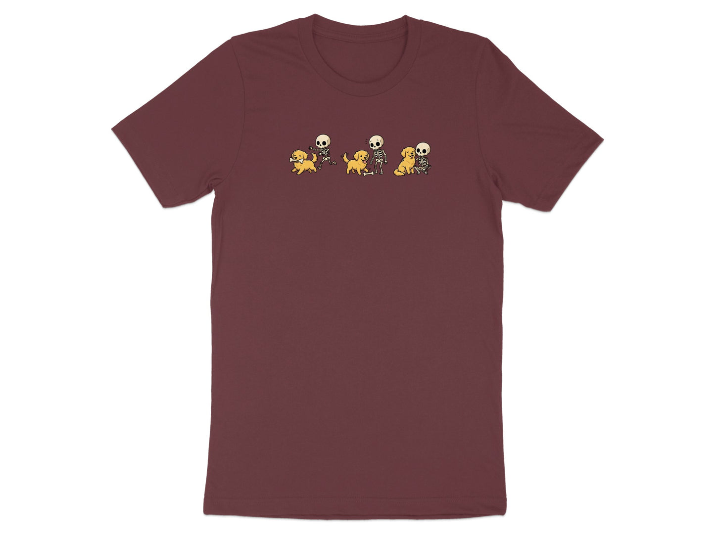 Maroon t-shirt with graphic of three skeletons interacting with golden retrievers and bones.