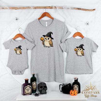 Grey graphic t-shirts and onesie with Halloween owl design and potions.