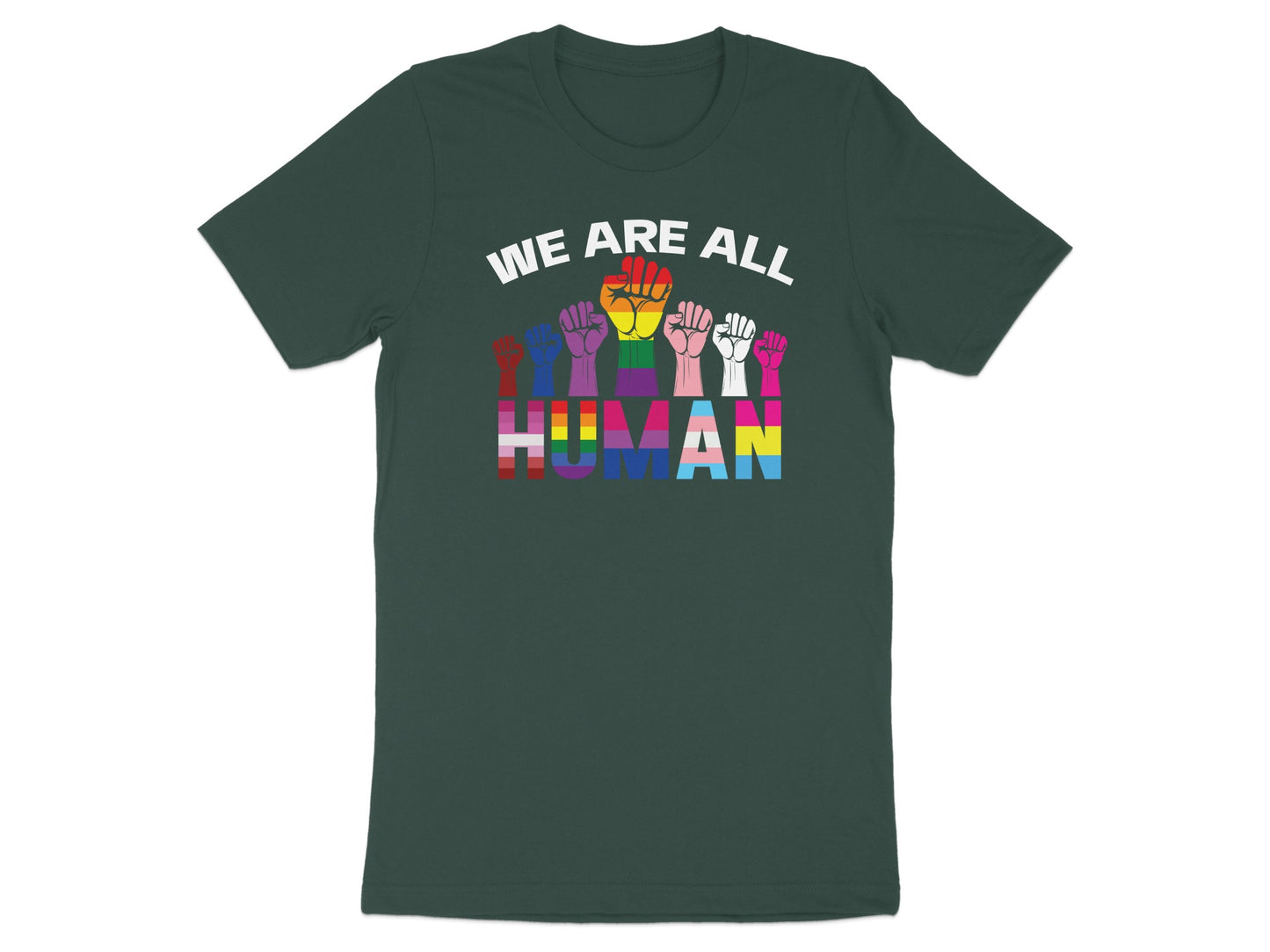Dark t-shirt with "WE ARE ALL HUMAN" text in rainbow and transgender pride colors.