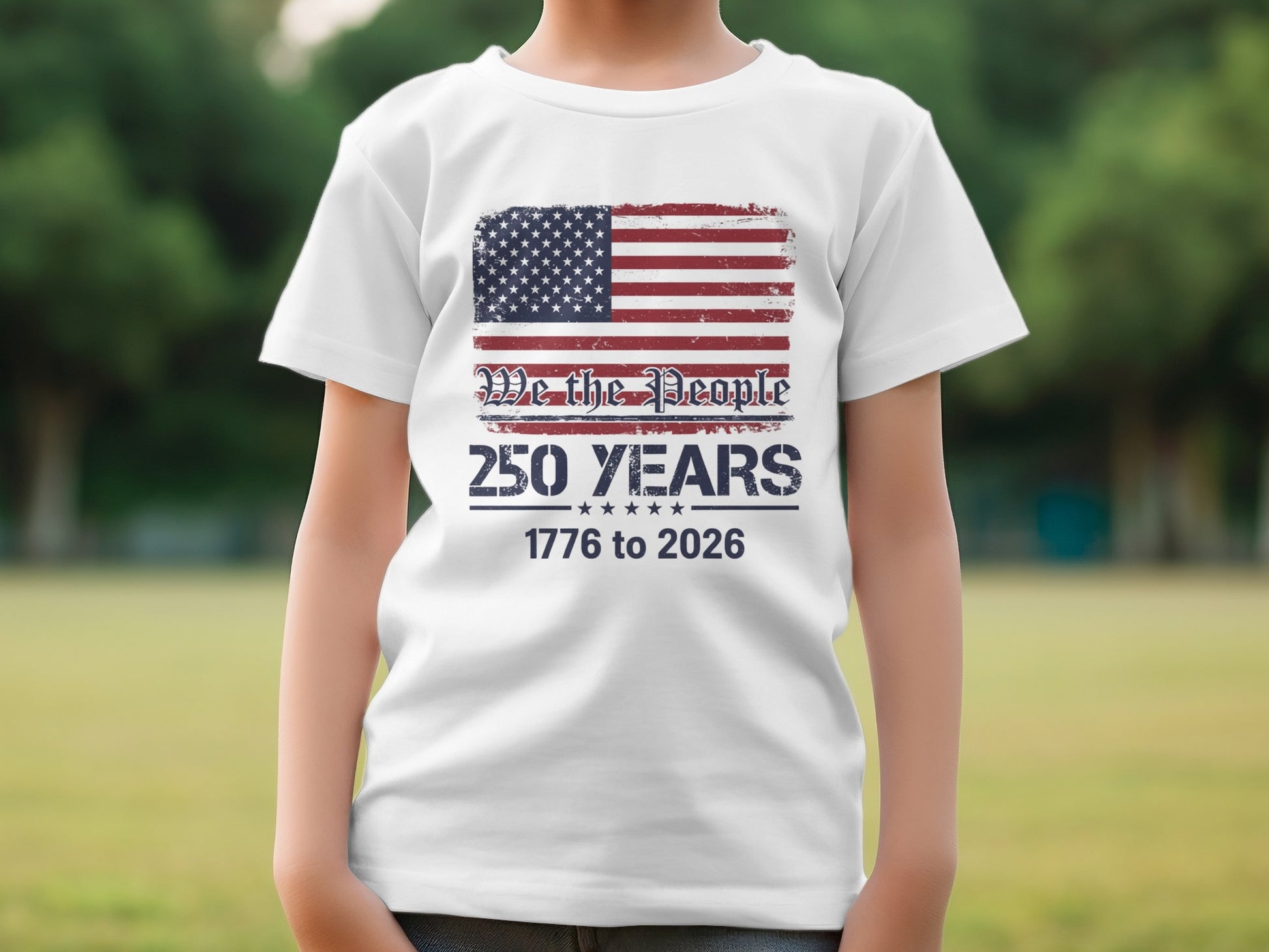 Child wearing white t-shirt with distressed American flag and "We The People 250 Years" text.