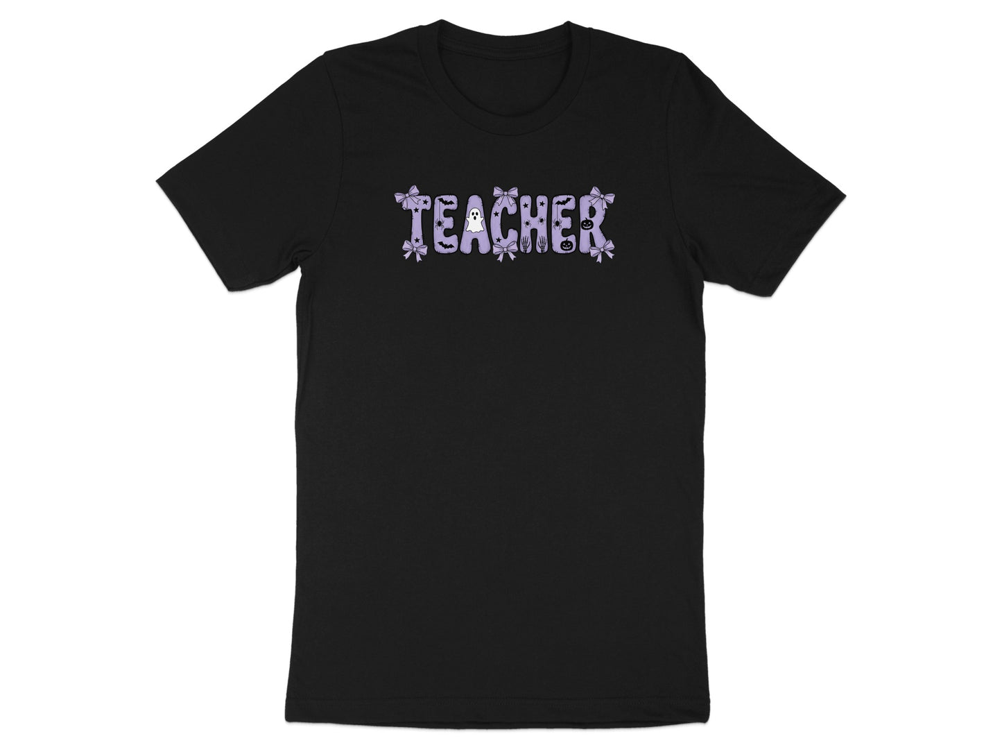 Black t-shirt with "TEACHER" in purple lettering with Halloween-themed embellishments.
