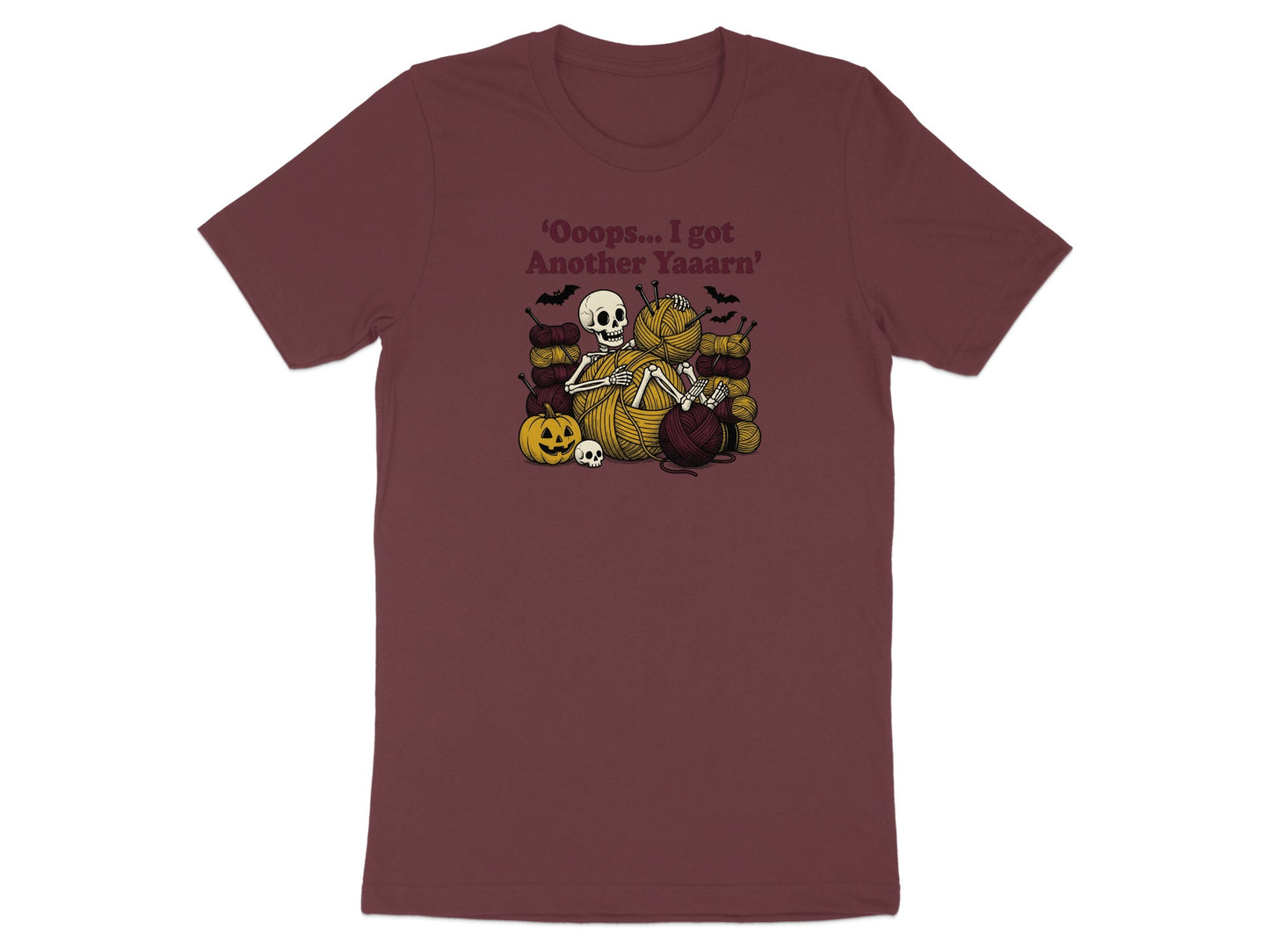 Skeleton surrounded by yarn, bats, pumpkin, and skulls with text 'Oooops... I got Another Yaaarn'.