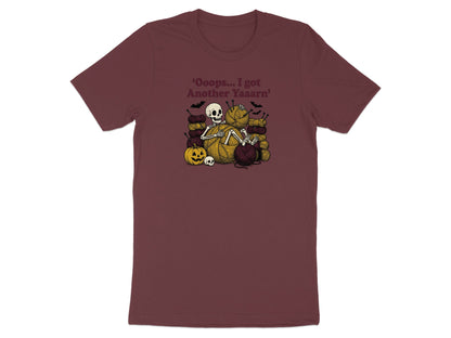 Skeleton surrounded by yarn, bats, pumpkin, and skulls with text 'Oooops... I got Another Yaaarn'.