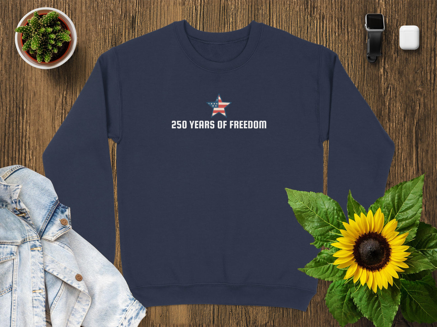 Navy sweatshirt with "250 YEARS OF FREEDOM" and a star emblem.