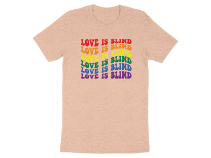 Peach t-shirt with rainbow text reading "LOVE IS BLIND" stacked vertically.
