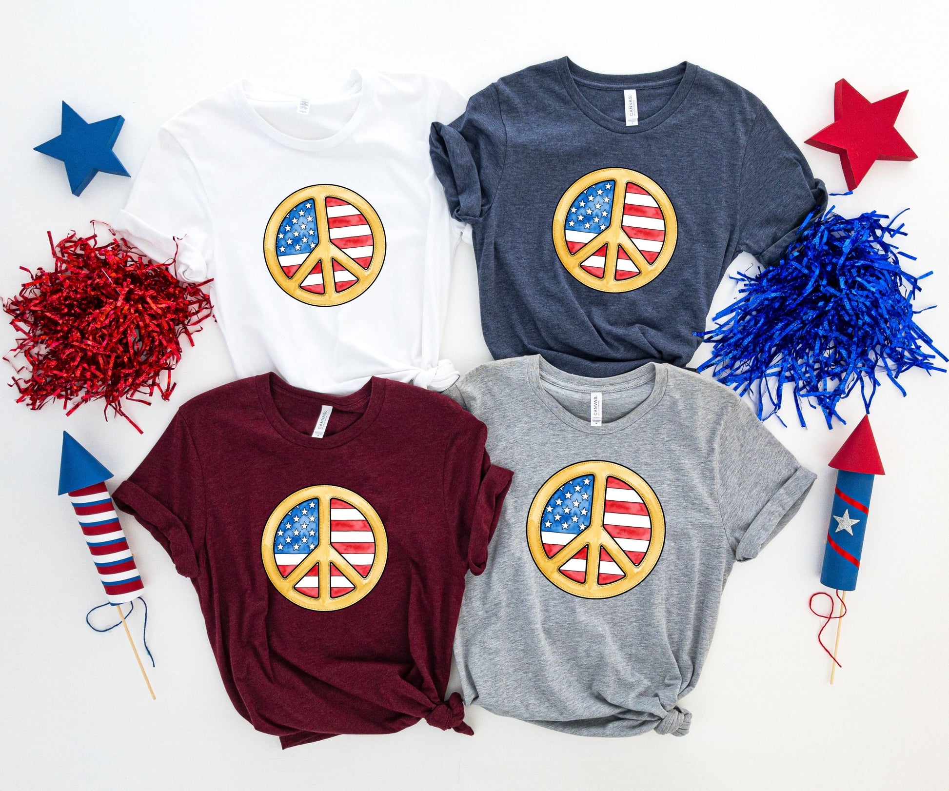 Four t-shirts with a peace sign featuring the American flag.