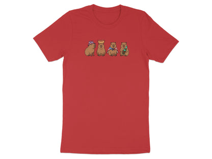 Four capybaras wearing accessories, on a red t-shirt.