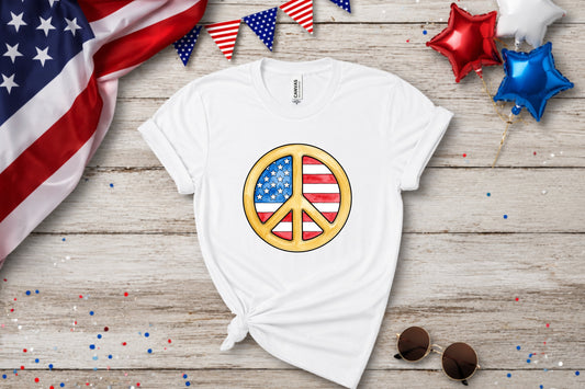 White t-shirt with a peace sign featuring the American flag design.