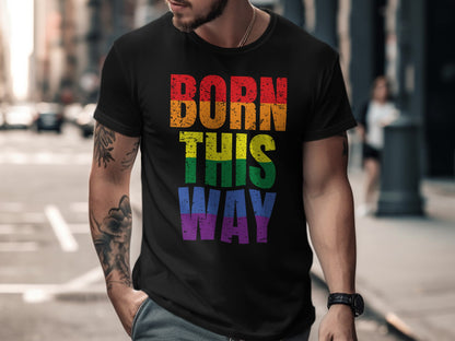 Black t-shirt with "Born This Way" in rainbow gradient letters.