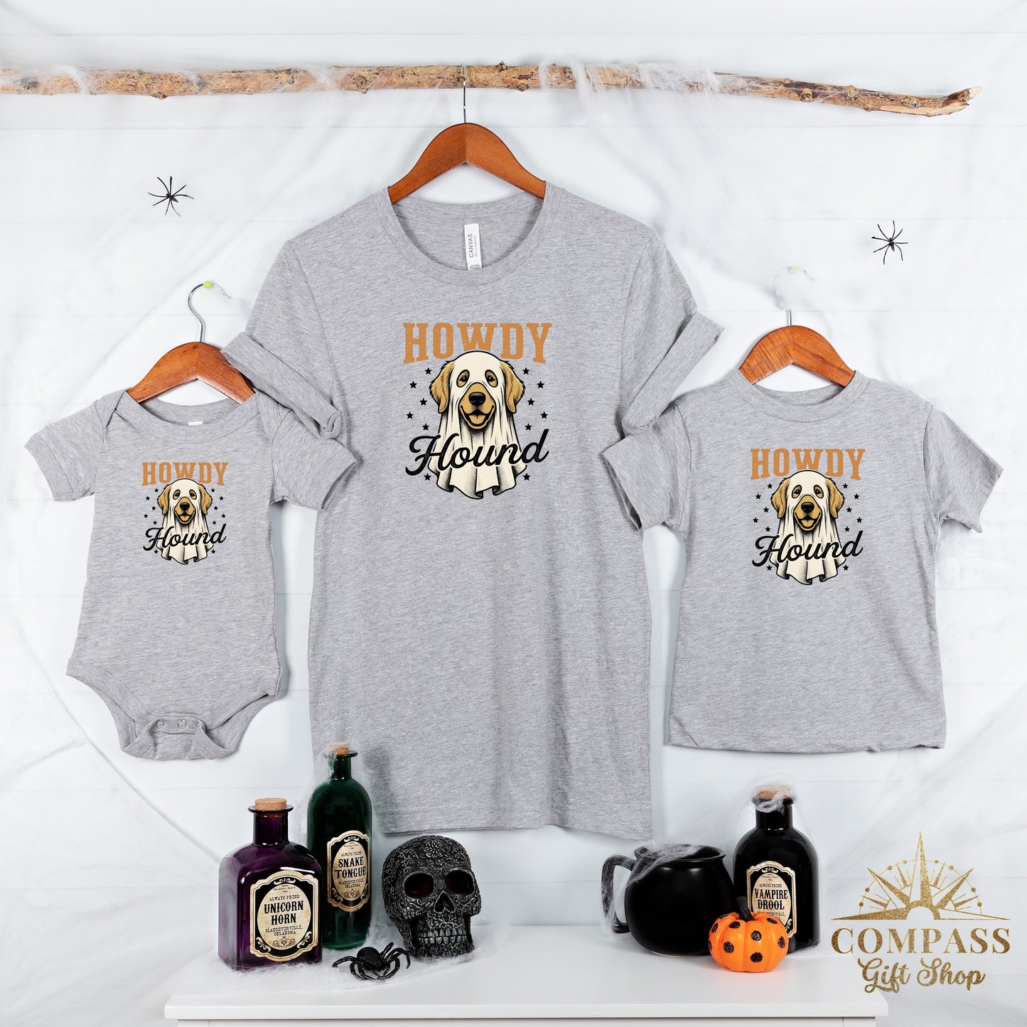 Three grey t-shirts and a bodysuit with "Howdy Hound" ghost dog graphic.