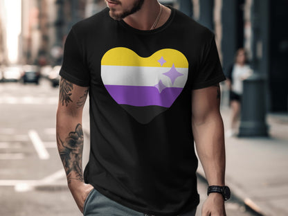 Black t-shirt with a non-binary pride heart symbol featuring yellow, white, purple stripes and purple stars.