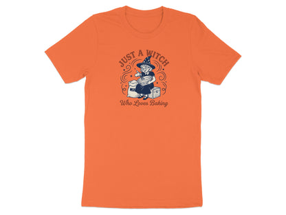 Orange t-shirt with a witch baking graphic and text "Just a Witch Who Loves Baking".