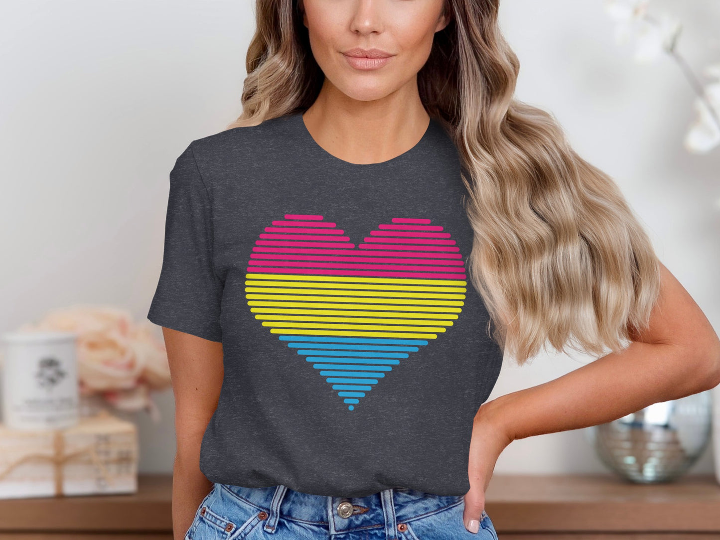 Dark t-shirt with a pansexual pride heart design.