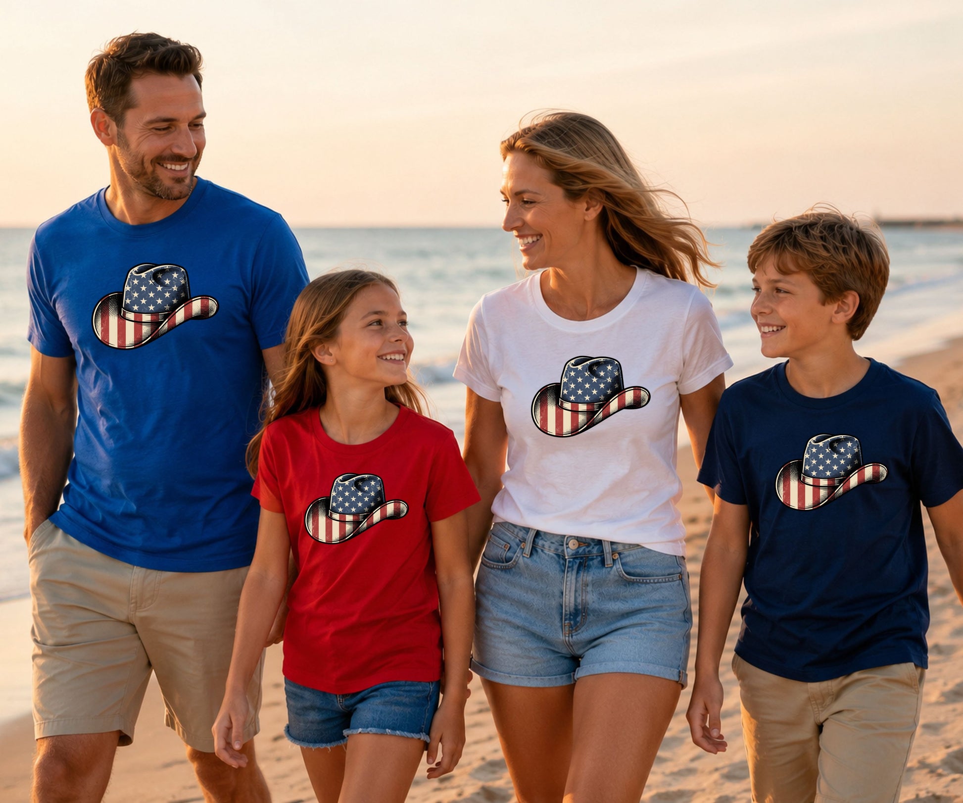 Family on beach wearing patriotic cowboy hats t-shirts.