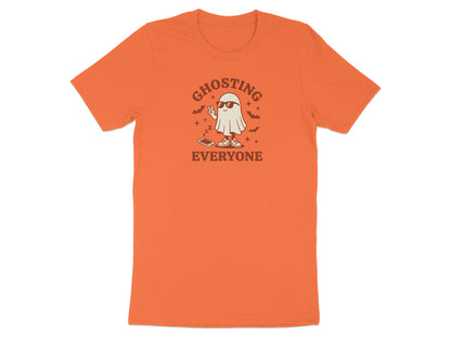 Orange t-shirt with ghost graphic saying "Ghosting Everyone".