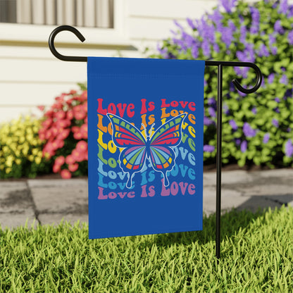 Blue garden flag with rainbow butterfly and "Love Is Love" text.