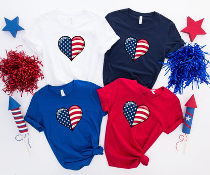 Four t-shirts, two with American flag heart graphics.