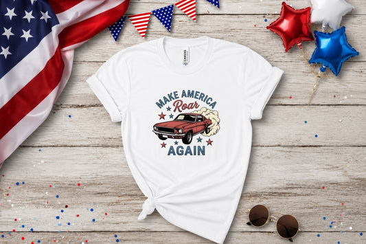 White t-shirt with "Make America Roar Again" and a vintage red muscle car.