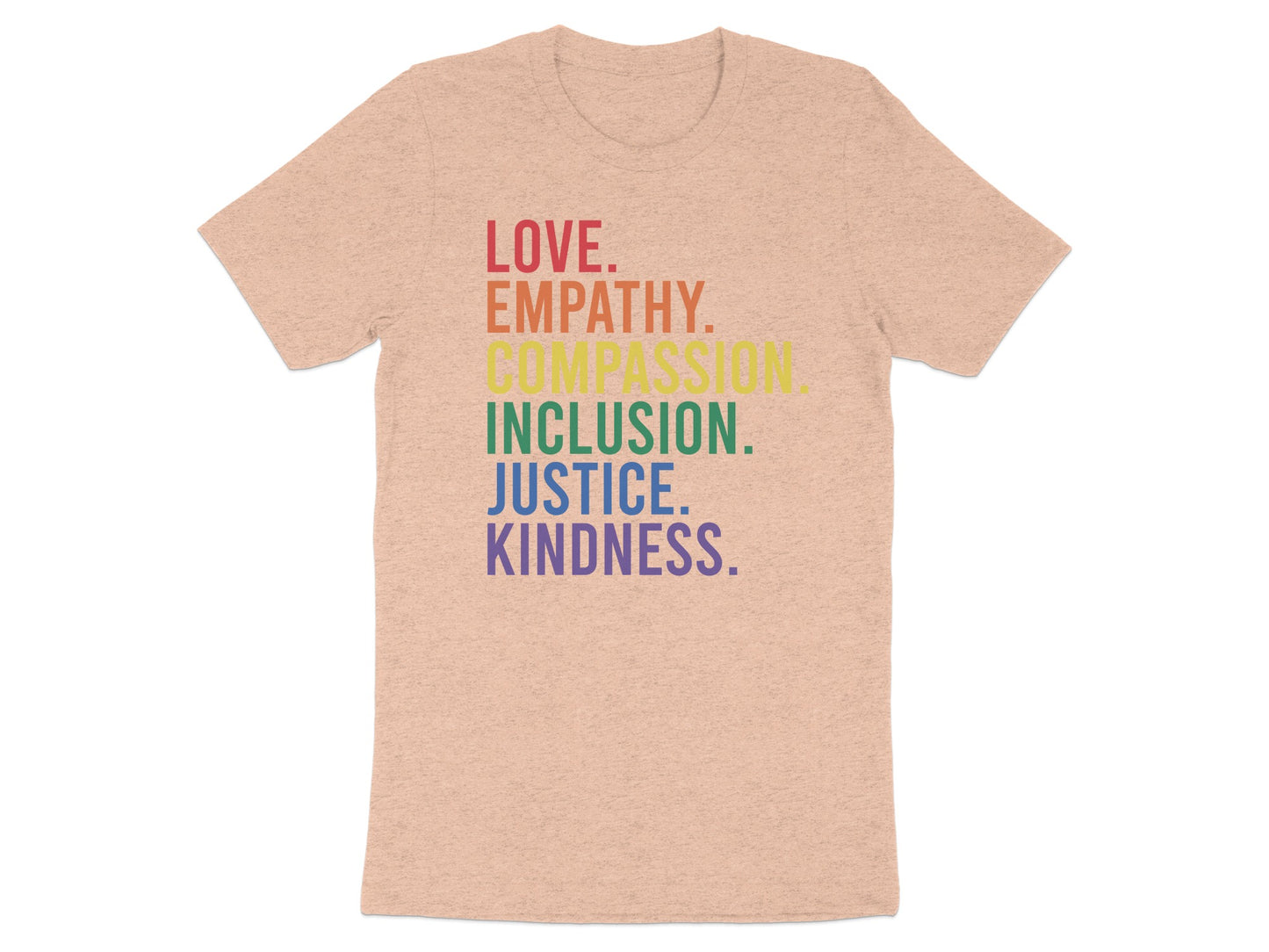 Peach t-shirt with rainbow text: Love, Empathy, Compassion, Inclusion, Justice, Kindness.