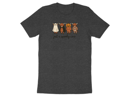Dark gray t-shirt with four Highland cows in Halloween costumes and "just a spooky cow" text.