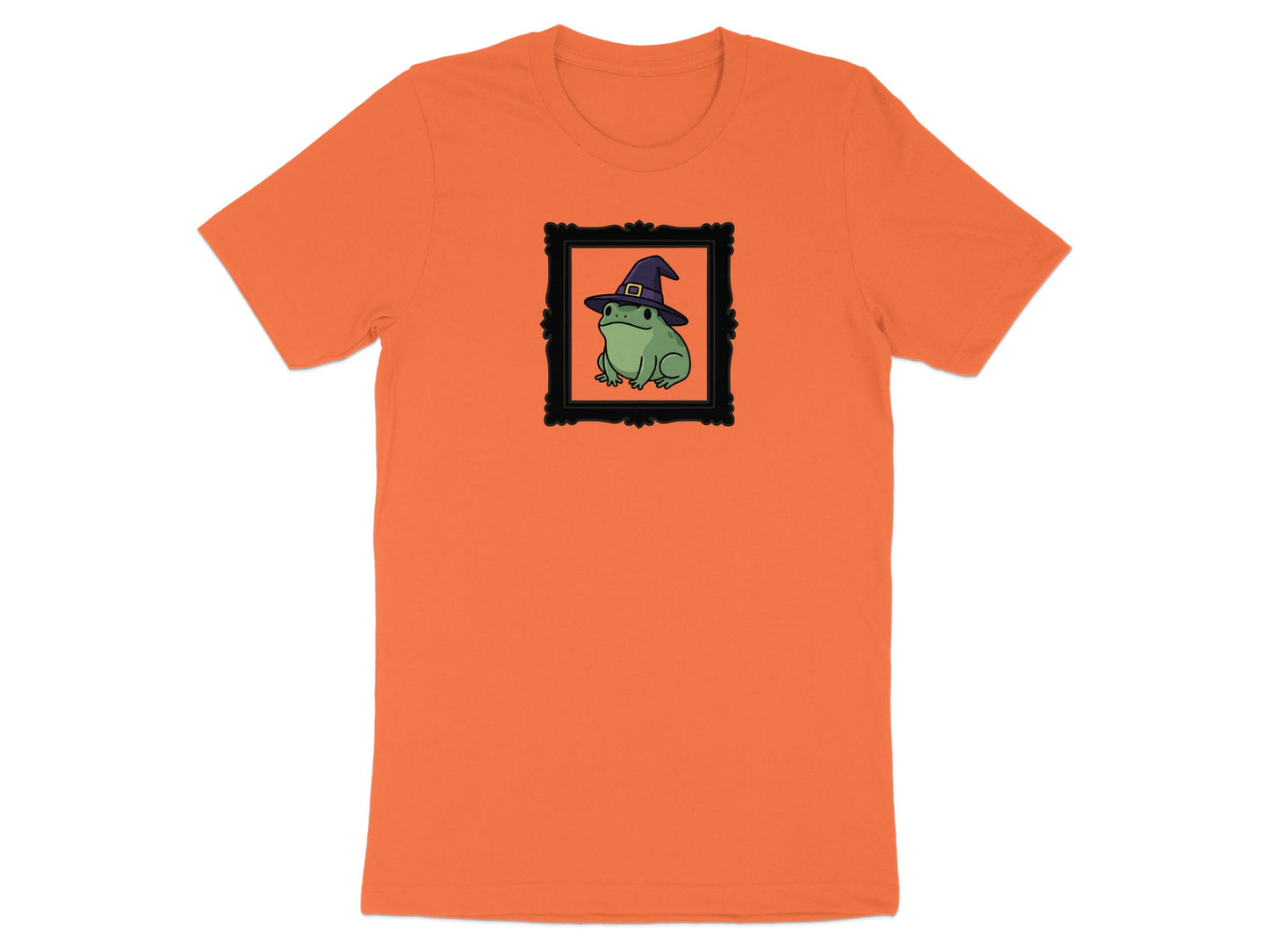 Orange t-shirt with a framed illustration of a frog wearing a witch hat.