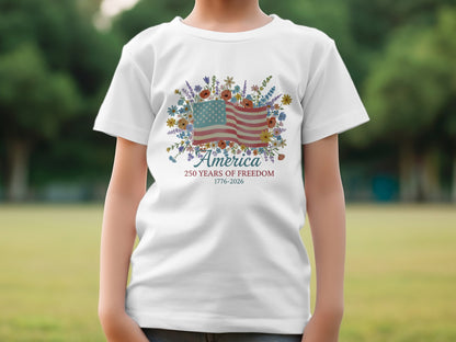 White t-shirt with "America 250 Years of Freedom 1776-2026" and floral flag.