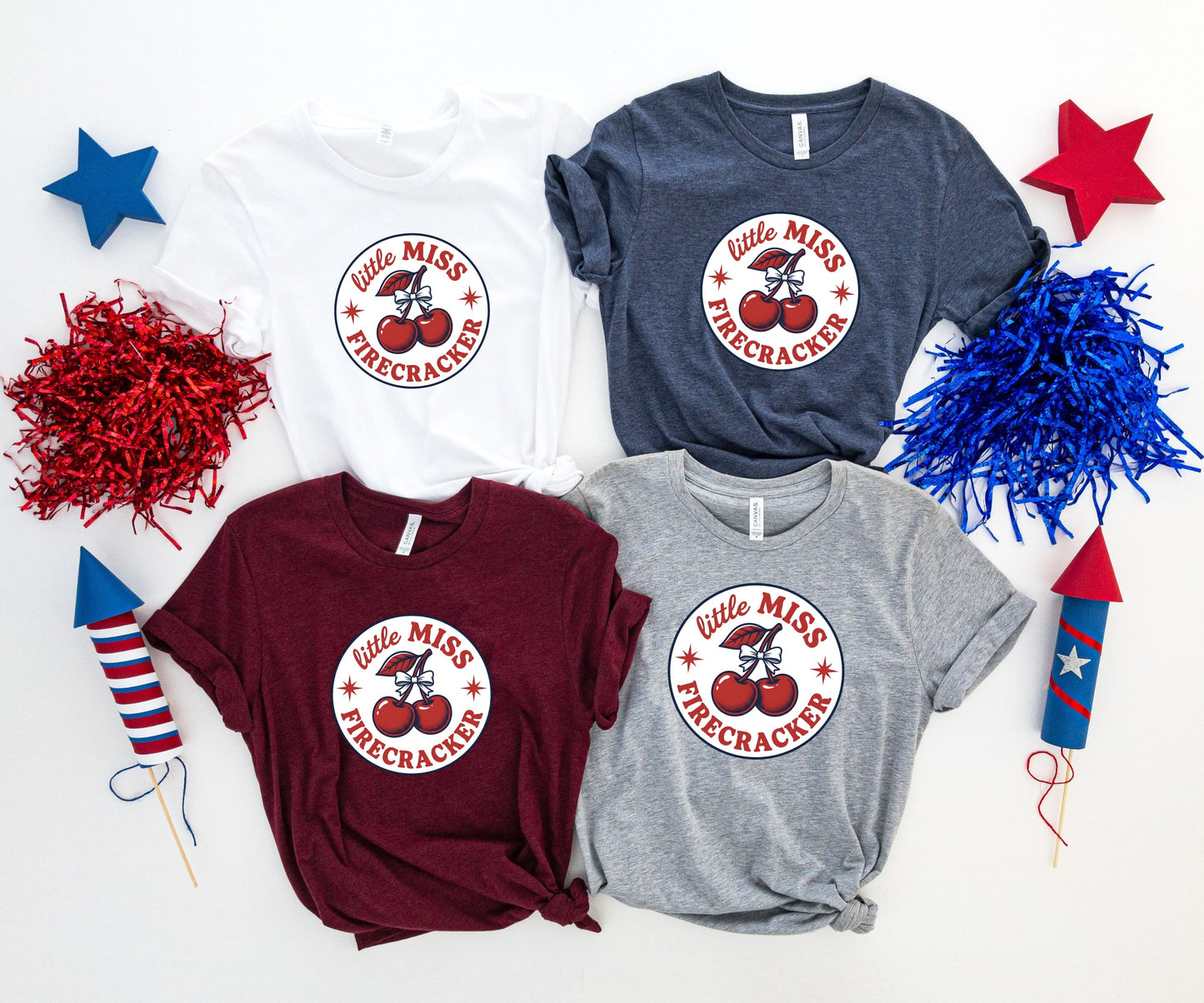 Four t-shirts with "little MISS FIRECRACKER" design and cherry graphic.