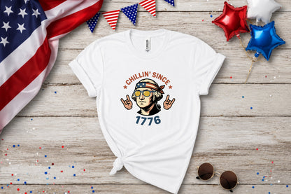 White t-shirt with "Chillin' Since 1776" text and patriotic graphic.