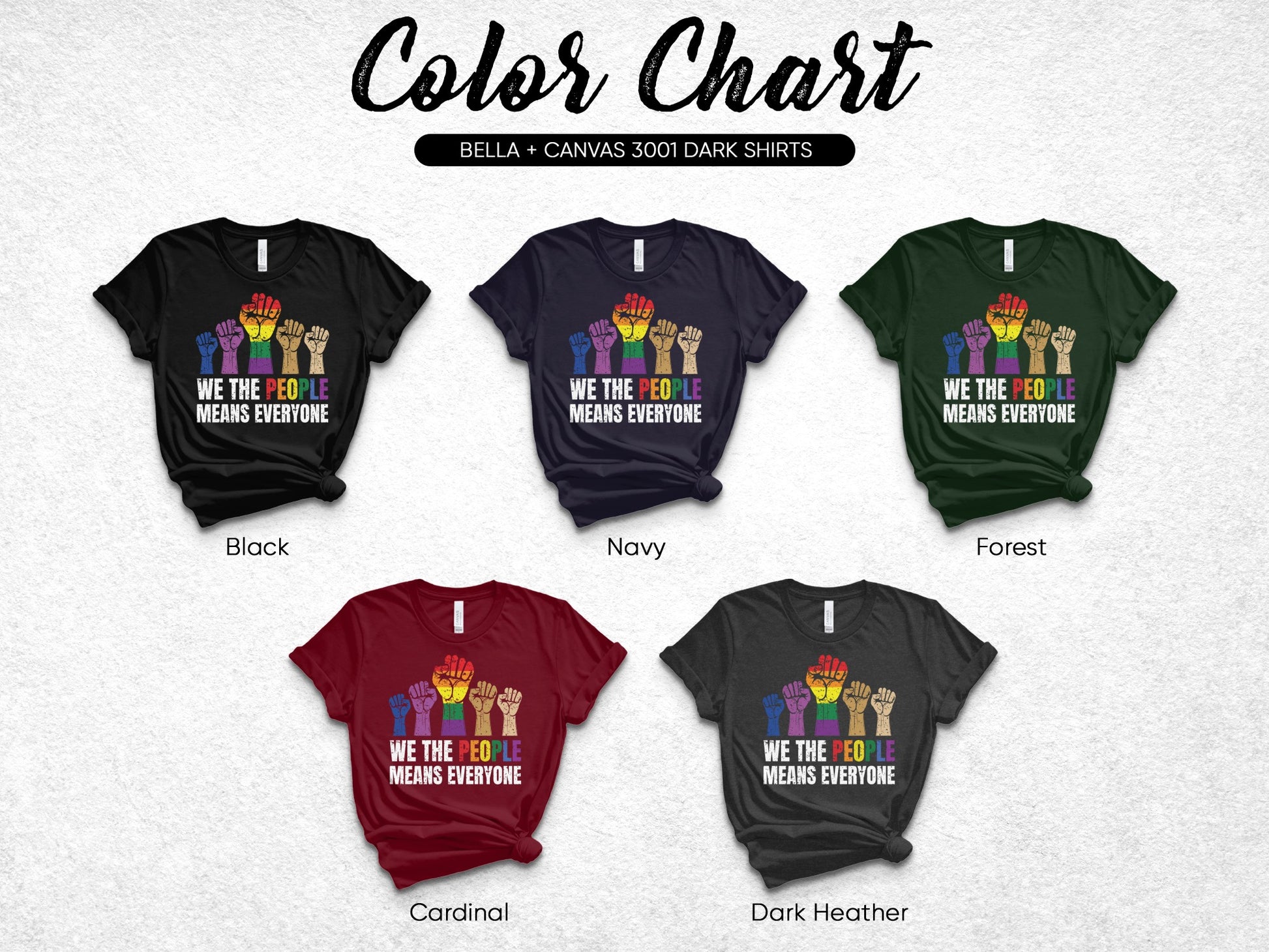 Five dark t-shirts in different colors showing a rainbow fist with "WE THE PEOPLE MEANS EVERYONE."