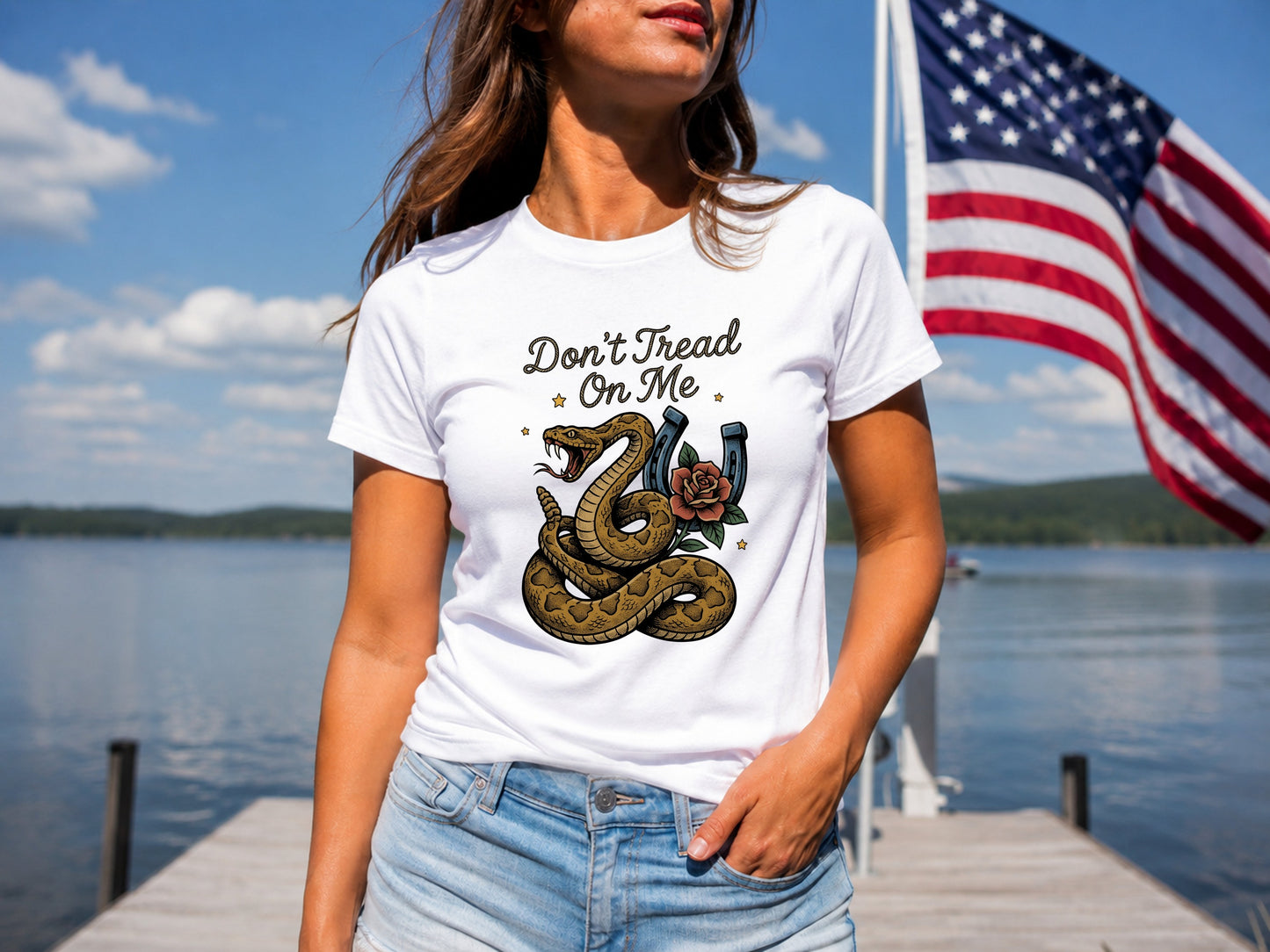 White t-shirt with Don't Tread On Me rattlesnake and horseshoe graphic.