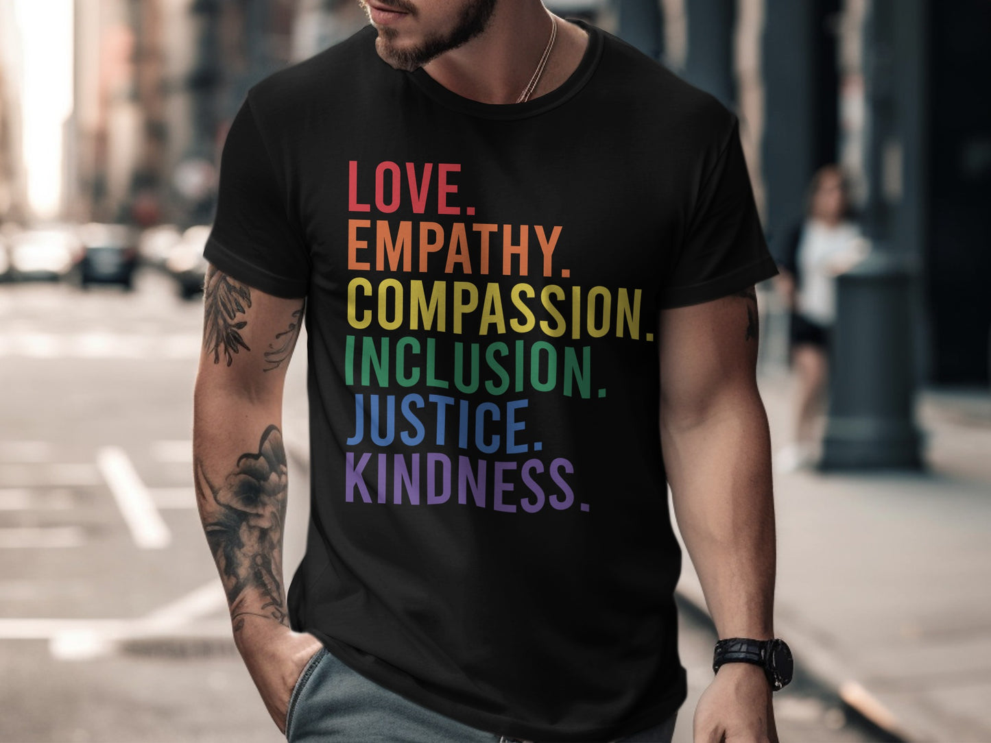 Black t-shirt with rainbow text: Love. Empathy. Compassion. Inclusion. Justice. Kindness.