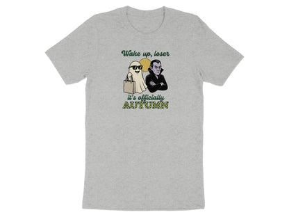 T-shirt graphic with ghost, vampire, and text "Wake up, loser it's officially AUTUMN".