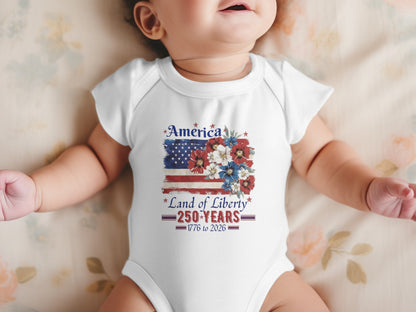 Baby bodysuit with American flag and "Land of Liberty 250 Years" text.
