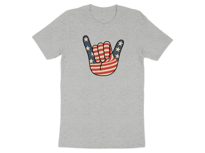 Hand gesture with American flag pattern on a grey t-shirt.