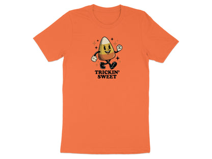 Orange t-shirt with cartoon candy corn saying "Trickin' Sweet".