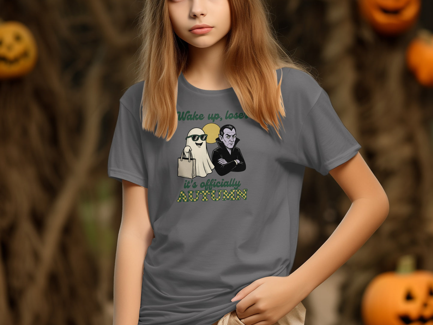 Grey t-shirt with a cartoon ghost and vampire graphic that reads "Wake up, loser, it's officially AUTUMN."